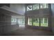 Spacious unfinished living room with lots of windows offering abundant natural light at 4835 Beechnut Circle, Cumming, GA 30028