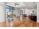 Bright living space with hardwood floors, modern decor, and an open layout to the dining area at 905 Juniper Ne St # 708, Atlanta, GA 30309