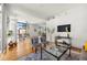 Spacious living room with modern decor, hardwood floors, large windows, and great natural light at 905 Juniper Ne St # 708, Atlanta, GA 30309