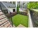Front yard featuring a manicured green lawn and manicured bushes at 1106 Briar Cove Cir, Atlanta, GA 30329