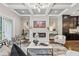 Cozy living room with a fireplace, coffered ceilings, and stylish decor at 1106 Briar Cove Cir, Atlanta, GA 30329