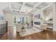 Spacious living room featuring coffered ceilings, a fireplace, and an open layout at 1106 Briar Cove Cir, Atlanta, GA 30329