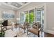 Bright living room boasts an open door to the balcony with stylish furniture and modern décor at 1106 Briar Cove Cir, Atlanta, GA 30329