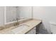 Bathroom featuring granite counters, undermount sink and ceramic tile shower at 3187 Abbeywood Dr, Decatur, GA 30034