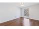 Bright bedroom with hardwood floors and a lattice window offering natural light at 3187 Abbeywood Dr, Decatur, GA 30034