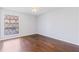 Bright bedroom with hardwood floors and a lattice window offering natural light at 3187 Abbeywood Dr, Decatur, GA 30034