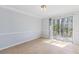 Empty dining room featuring hardwood floors and a sliding glass door at 3187 Abbeywood Dr, Decatur, GA 30034