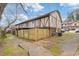 Charming exterior of a townhome showcasing a new wooden fence and well-maintained grounds at 3187 Abbeywood Dr, Decatur, GA 30034