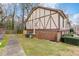 Exterior of a townhome with a lush green lawn, and manicured bushes at 3187 Abbeywood Dr, Decatur, GA 30034