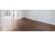 Spacious living area with hardwood floors leading to the sliding glass doors at 3187 Abbeywood Dr, Decatur, GA 30034