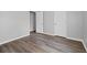 Bedroom features hard surface flooring and a neutral paint color; notice the closet at 3193 Deshong Dr, Stone Mountain, GA 30087