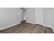 Bedroom features hard surface flooring and a neutral paint color; notice the closet at 3193 Deshong Dr, Stone Mountain, GA 30087
