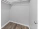 Walk-in closet with ample storage space and new flooring at 3193 Deshong Dr, Stone Mountain, GA 30087