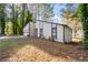 Charming single-Gathering home featuring a symmetrical front facade with a two-car garage and beautiful front yard at 3193 Deshong Dr, Stone Mountain, GA 30087