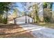 Charming single-Gathering home featuring a symmetrical front facade with a two-car garage and beautiful front yard at 3193 Deshong Dr, Stone Mountain, GA 30087