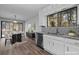 Well-lit kitchen features modern appliances, ample counter space, and a breakfast nook with a view at 3193 Deshong Dr, Stone Mountain, GA 30087