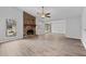 Bright living room with fireplace and luxury vinyl plank flooring at 3193 Deshong Dr, Stone Mountain, GA 30087