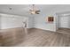Large open floorplan with luxury vinyl plank flooring and neutral paint colors at 3193 Deshong Dr, Stone Mountain, GA 30087