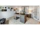 Stylish home office featuring a rustic desk, comfortable seating, and ample natural light at 401 Village Ln, Fairburn, GA 30213