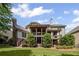 Expansive backyard features a multi-level deck with a hot tub, perfect for relaxation and entertainment at 5025 Savannah Run, Cumming, GA 30040