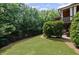Spacious backyard with lush greenery, providing a private and tranquil outdoor retreat at 5025 Savannah Run, Cumming, GA 30040