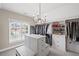 Spacious walk-in closet with custom shelving and island, offering ample storage at 5025 Savannah Run, Cumming, GA 30040