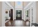 Elegant foyer with soaring ceilings, dark hardwood floors, and a grand entrance, offering a luxurious welcome at 5025 Savannah Run, Cumming, GA 30040