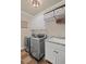 Well-equipped laundry room with modern appliances, granite counters, and storage at 5025 Savannah Run, Cumming, GA 30040