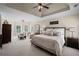 Bright and spacious main bedroom featuring a sitting area and ample natural light at 5025 Savannah Run, Cumming, GA 30040