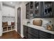 Mudroom area with custom bench, coat hooks, and storage cabinets near the entrance at 5025 Savannah Run, Cumming, GA 30040