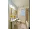 Cozy bathroom featuring tile flooring and a vanity with a sink at 1147 Halletts Peak Pl, Lawrenceville, GA 30044