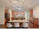 Open concept kitchen with stainless steel appliances and a dining area at 1147 Halletts Peak Pl, Lawrenceville, GA 30044