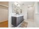 Modern bathroom features a double sink vanity, sleek mirrors, and a tiled shower at 1667 Atherton Cir, Decatur, GA 30035