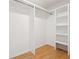 Spacious walk-in closet with custom shelving and rod, ensuring organized storage at 1667 Atherton Cir, Decatur, GA 30035