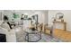 Open-concept living space with modern kitchen, dining area, and comfortable seating arrangement at 1667 Atherton Cir, Decatur, GA 30035