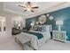 Spacious main bedroom featuring a trey ceiling, fan, and accent wall at 316 Navigator Ln, Mcdonough, GA 30253