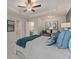 Spacious main bedroom featuring a trey ceiling, fan, and ensuite bath at 316 Navigator Ln, Mcdonough, GA 30253