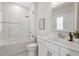 This bathroom features a shower-over-tub, bright lighting, and a modern, neutral aesthetic at 392 Concord St, Alpharetta, GA 30009