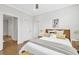 Bright bedroom features hardwood floors, a ceiling fan, and a well-lit, comfortable space at 392 Concord St, Alpharetta, GA 30009