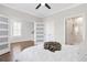 Relaxing bedroom showcases a modern ceiling fan, and a conveniently located en-suite bathroom at 392 Concord St, Alpharetta, GA 30009