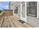 Outdoor deck with wood flooring and fenced area for privacy at 392 Concord St, Alpharetta, GA 30009