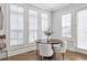 Cozy breakfast nook with ample natural light and seating for four, adjacent to the kitchen at 392 Concord St, Alpharetta, GA 30009