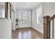 Elegant foyer featuring hardwood floors, natural light, and a welcoming entryway at 392 Concord St, Alpharetta, GA 30009