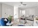 This living room features hardwood floors, modern furniture, and neutral walls at 392 Concord St, Alpharetta, GA 30009