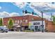 Street view of businesses in historic brick buildings with restaurants and retail shopping at 392 Concord St, Alpharetta, GA 30009