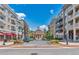 Street view of downtown buildings with shopping and residential condos above at 392 Concord St, Alpharetta, GA 30009