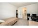 Bedroom with neutral paint, carpet, two twin beds, and work stations at 4832 Stone Way Path, Buford, GA 30519