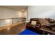 Cozy loft area with hardwood floors, comfortable seating, and natural light at 4832 Stone Way Path, Buford, GA 30519