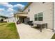 Large patio area ideal for outdoor dining and gatherings in a serene backyard setting at 4832 Stone Way Path, Buford, GA 30519