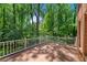 Relaxing brick home backyard with a spacious wooden deck, perfect for entertaining at 763 Old Paper Mill Se Dr, Marietta, GA 30067